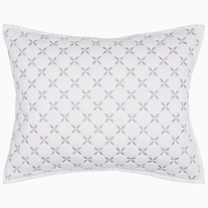 A Layla Lavender Quilt pillow with a cross design, made from cotton voile, by John Robshaw.