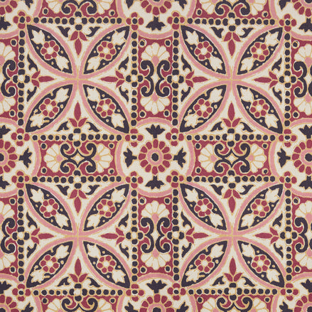 A pink and black Oman Berry Fabric tile with a floral design, featuring a block print pattern by John Robshaw.