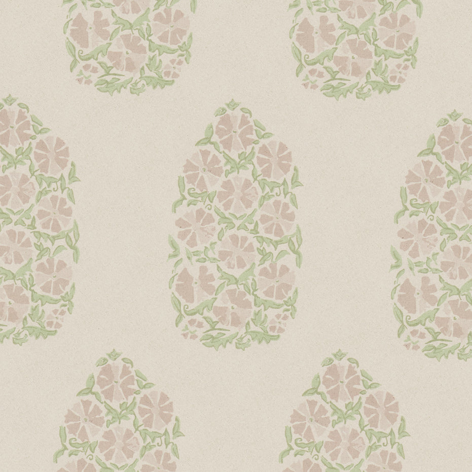 An oversized Saanya Sage Fabric wallpaper with green and pink flowers on it by John Robshaw.