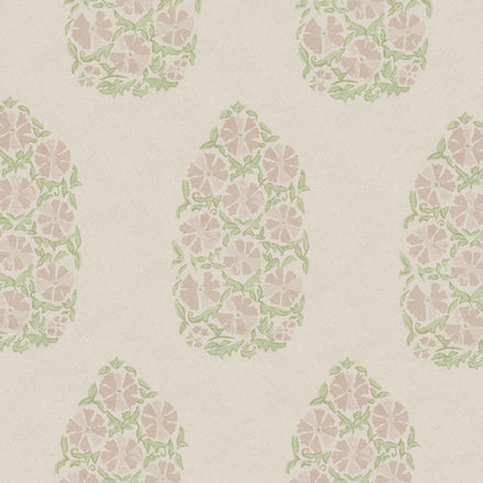 An oversized Saanya Sage Fabric wallpaper with green and pink flowers on it by John Robshaw.