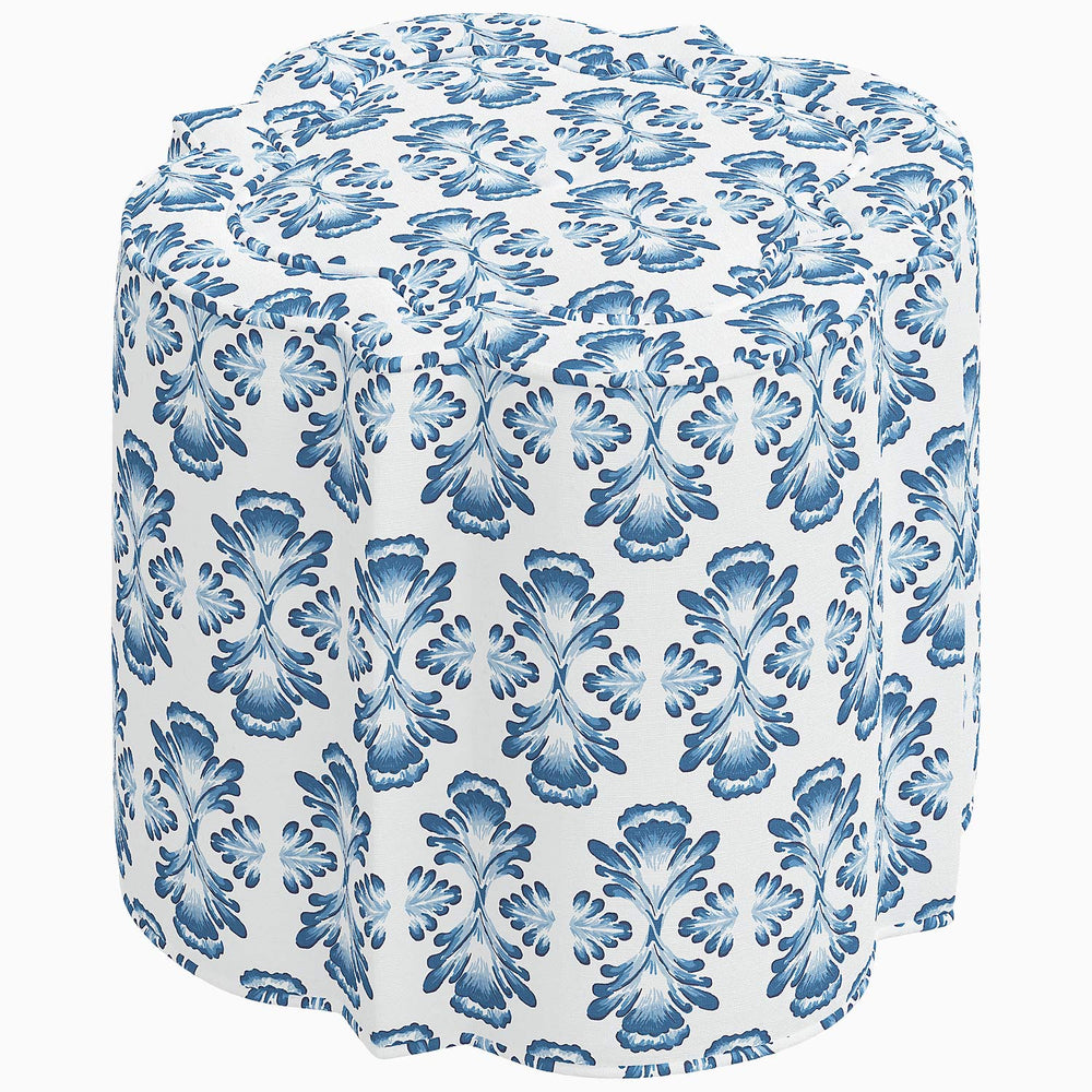 A blue and white Shiza Ottoman with a floral pattern, perfect as an ottoman for your interior by John Robshaw.