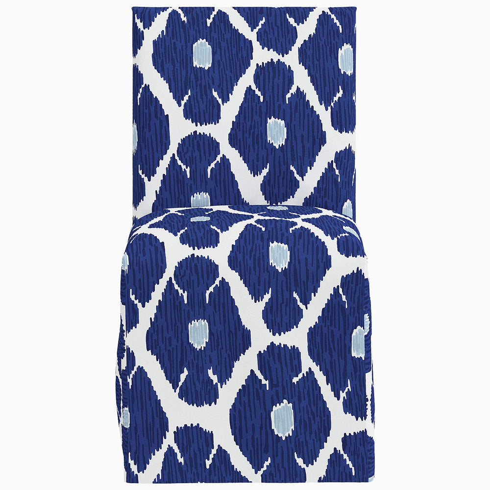 John Robshaw Sadia Slipcover Chair in a blue and white patterned dining chair slipcover.