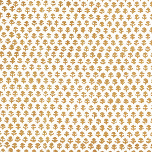 A Bindi Gold Fabric with a gold and white pattern on traditional hand block printed fabrics by John Robshaw.