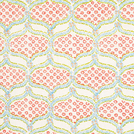 A pink and blue floral pattern, created using Hasati Lotus Fabric by skilled artisans from John Robshaw.