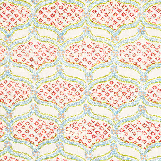 A pink and blue floral pattern on a white background, created using Hasati Lotus Fabric by skilled artisans from John Robshaw.