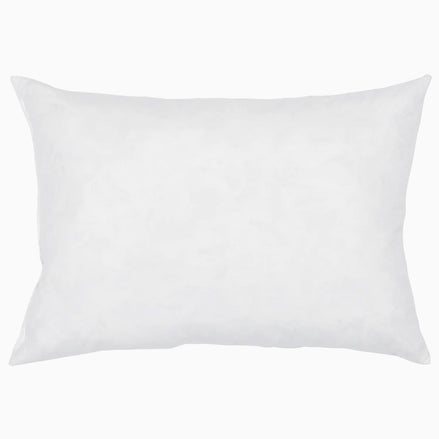 A hypo-allergenic John Robshaw white pillow on a white background.