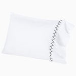 A white Stitched Ink Organic Sheets pillow with black embroidered designs from John Robshaw. - 30273364197422