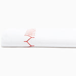 A John Robshaw Stitched Coral Organic Sheets with embroidered red stitching designs. - 30273362591790
