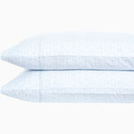 A pair of Ramra Light Indigo Organic Sheets made of organic cotton percale with sheet prints, machine washable, on a white background. (Brand Name: John Robshaw) - 30252457918510