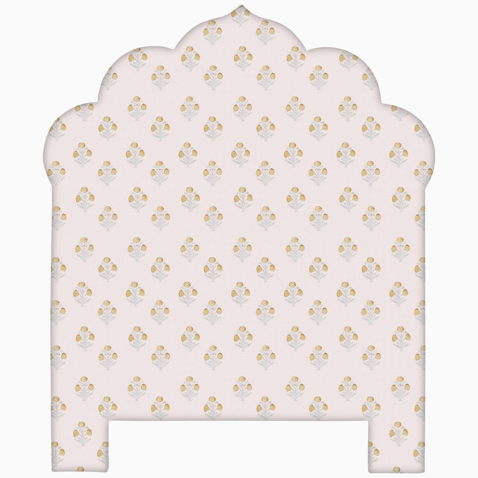 A John Robshaw handmade pink and gold floral pattern on a white background for the Custom Bihar Headboard.