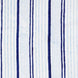 A Lapis Quilt by John Robshaw, handcrafted look blue and white striped fabric.