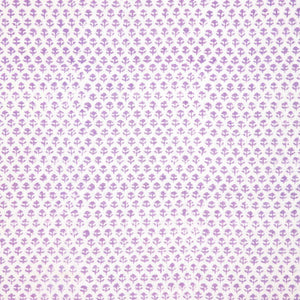 A Bindi Lavender Fabric with a purple and white polka dot pattern featuring traditional craftsmanship by John Robshaw.