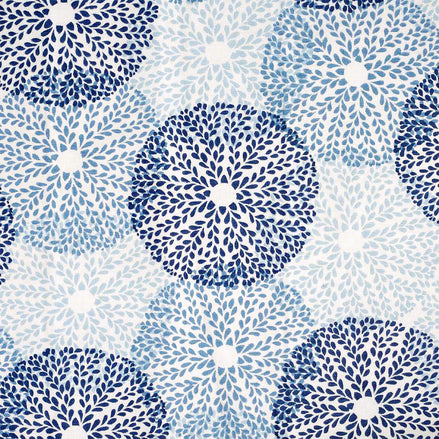 A blue and white floral pattern featuring artisan craftsmanship, the Chand Lapis Fabric designed by John Robshaw.