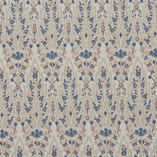 A blue and pink floral pattern reminiscent of Mughal gardens on John Robshaw's Marmar Primrose Performance Fabric.