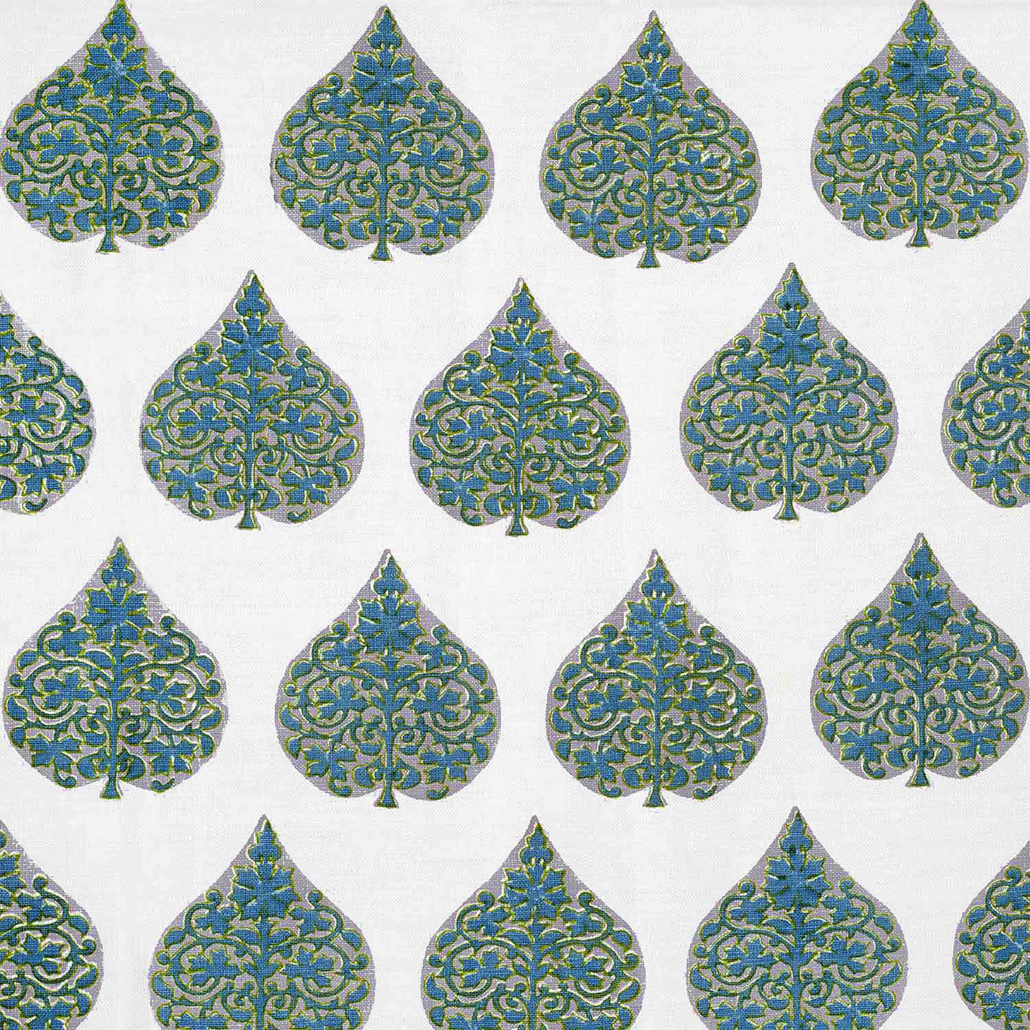A hand block printed Ratana Peacock fabric in blue and green leaf pattern on a white linen/cotton blend fabric, showcasing traditional craftsmanship by John Robshaw.