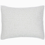 A white Organic Hand Stitched Moss Quilt pillow with hand stitched green dots on organic cotton voile by John Robshaw.